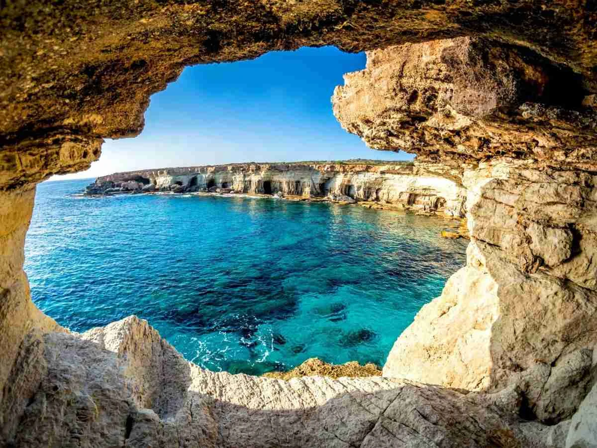  Spectacular caves carved by the sea over time, offering a unique and unforgettable view of the Cape Greco coastline.